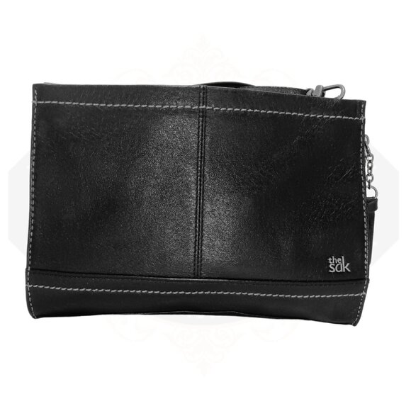 The Sak Handbags - the Sak Iris black leather crossbody clutch purse multi-color inter. fabric.